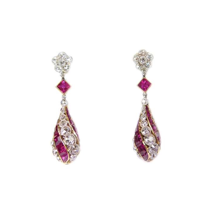 Pair of early 20th century ruby and diamond spiral line pendant earrings